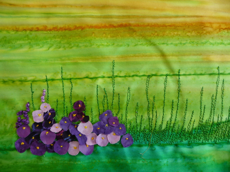 Gestickte Blumenbilder