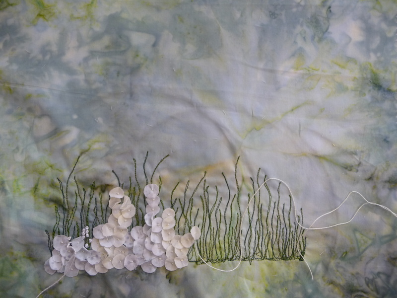 Gestickte Blumenbilder